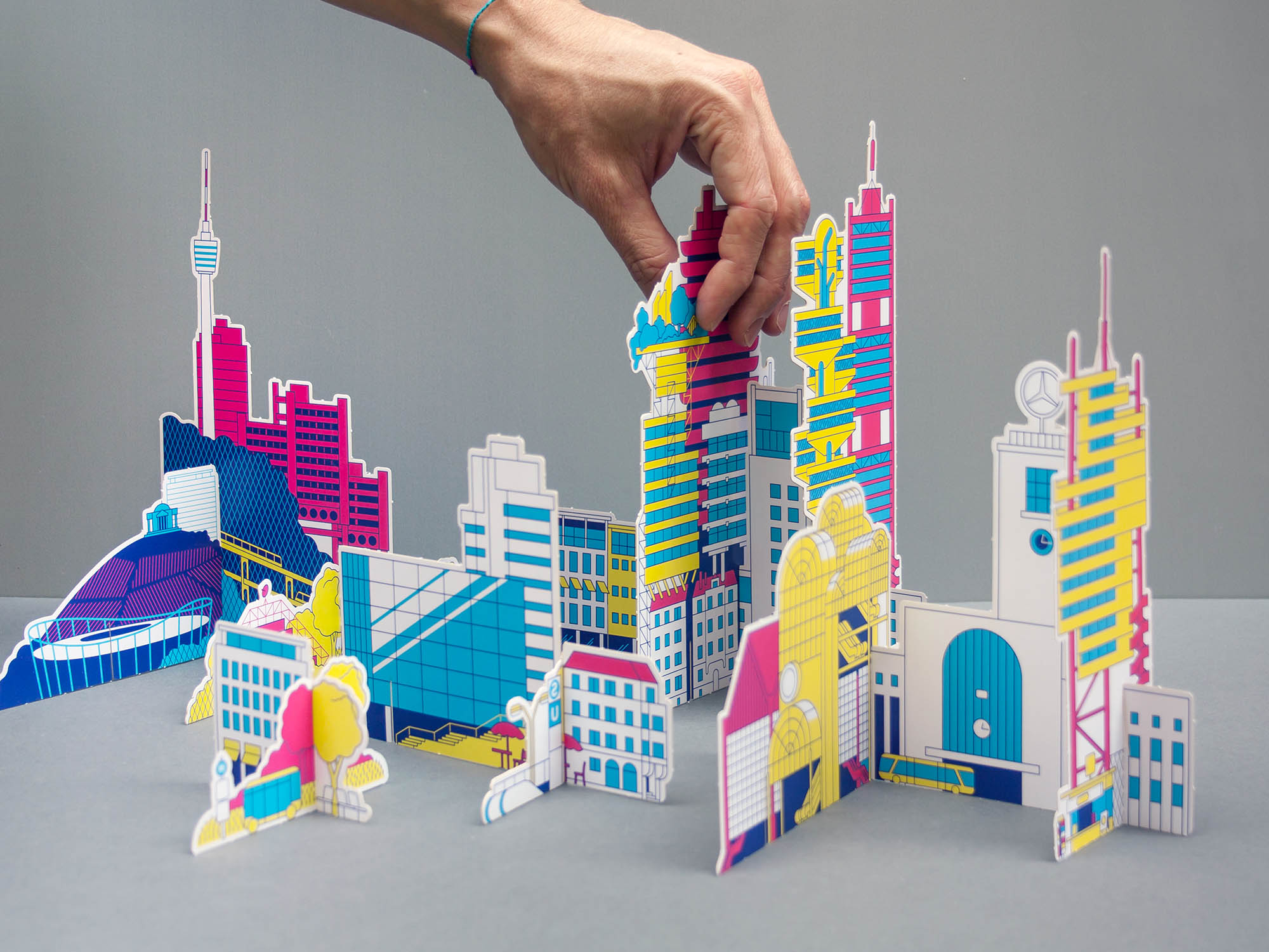 papercraft pop out architecture kit of brutalist and futuristic city. Designed by Axel Pfaender.